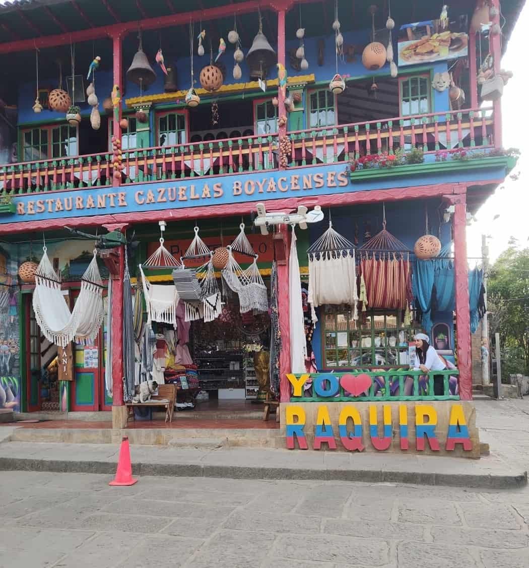Ráquira Colombia downtown restaurant and sign with lady